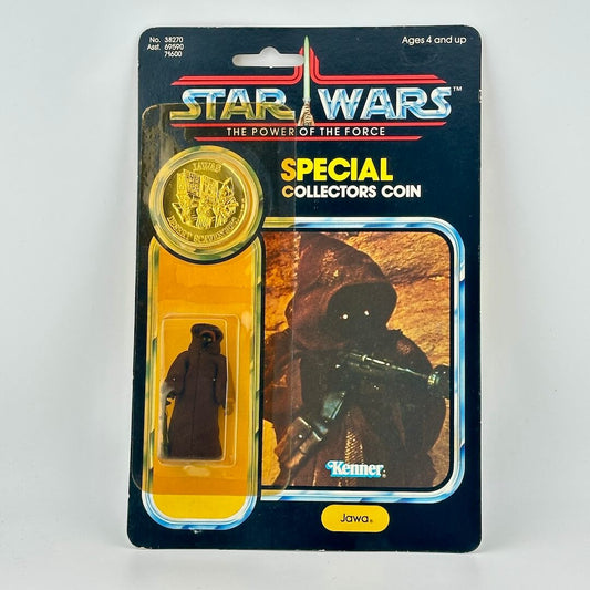 Star Wars Jawa collectible coin and figure in packaging with 'Kenner' branding