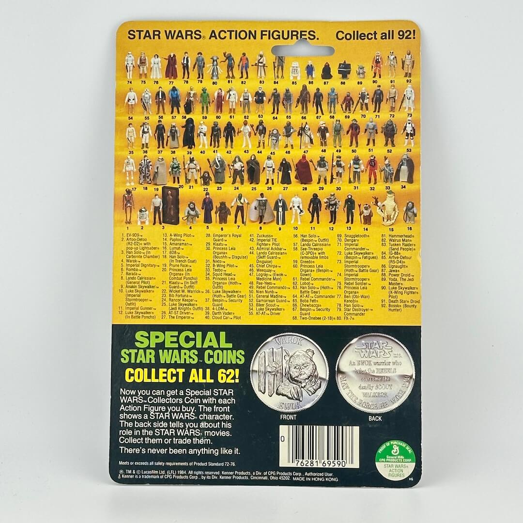 Star Wars action figure packaging with character list and coin on a white background