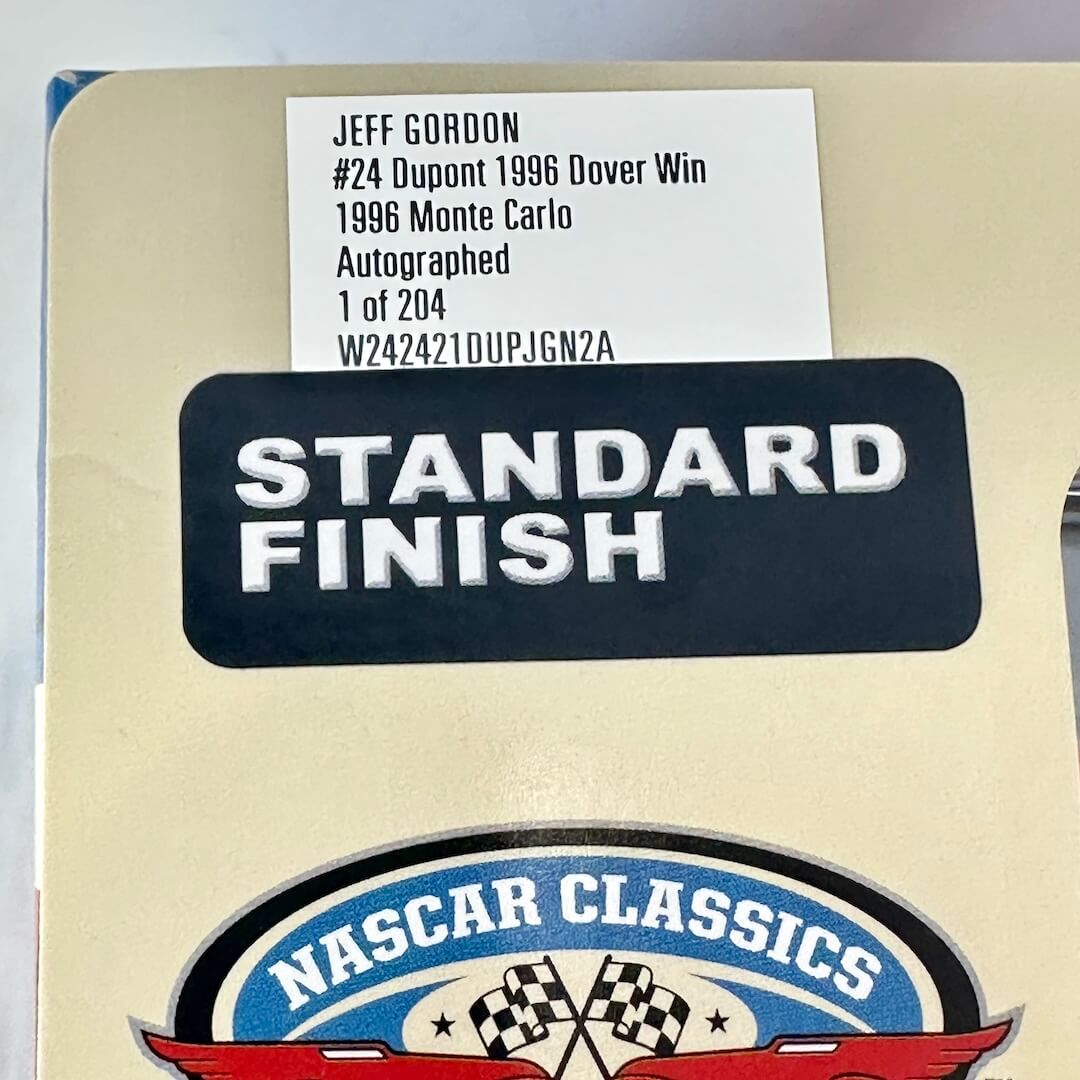 NASCAR Classics packaging with autographed note on a beige background