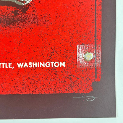 Bottom right corner showing no damage to corner or edges of poster. Artist signature in pencil in border.