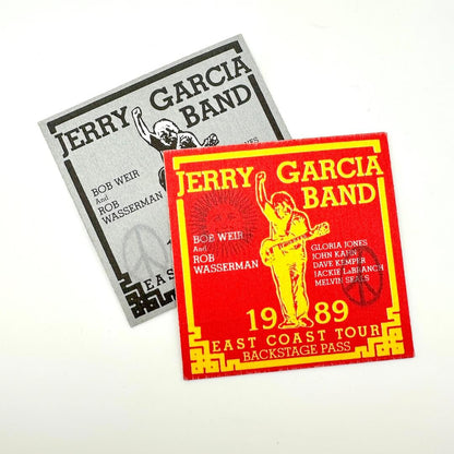 Two concert backstage passes for the Jerry Garcia Band's 1989 East Coast Tour on a white background.