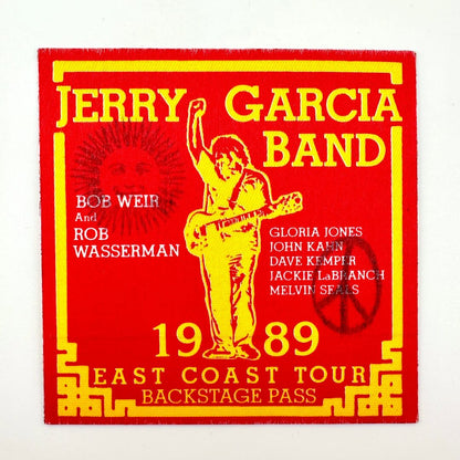 Jerry Garcia Band backstage pass with red and yellow design on a white background