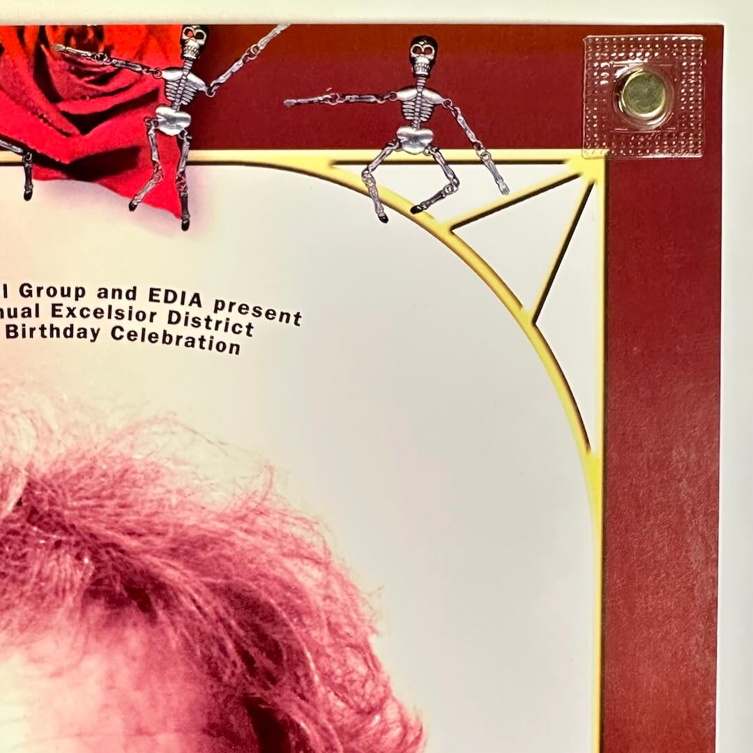 Top right corner of poster with no visible signs of damage. 