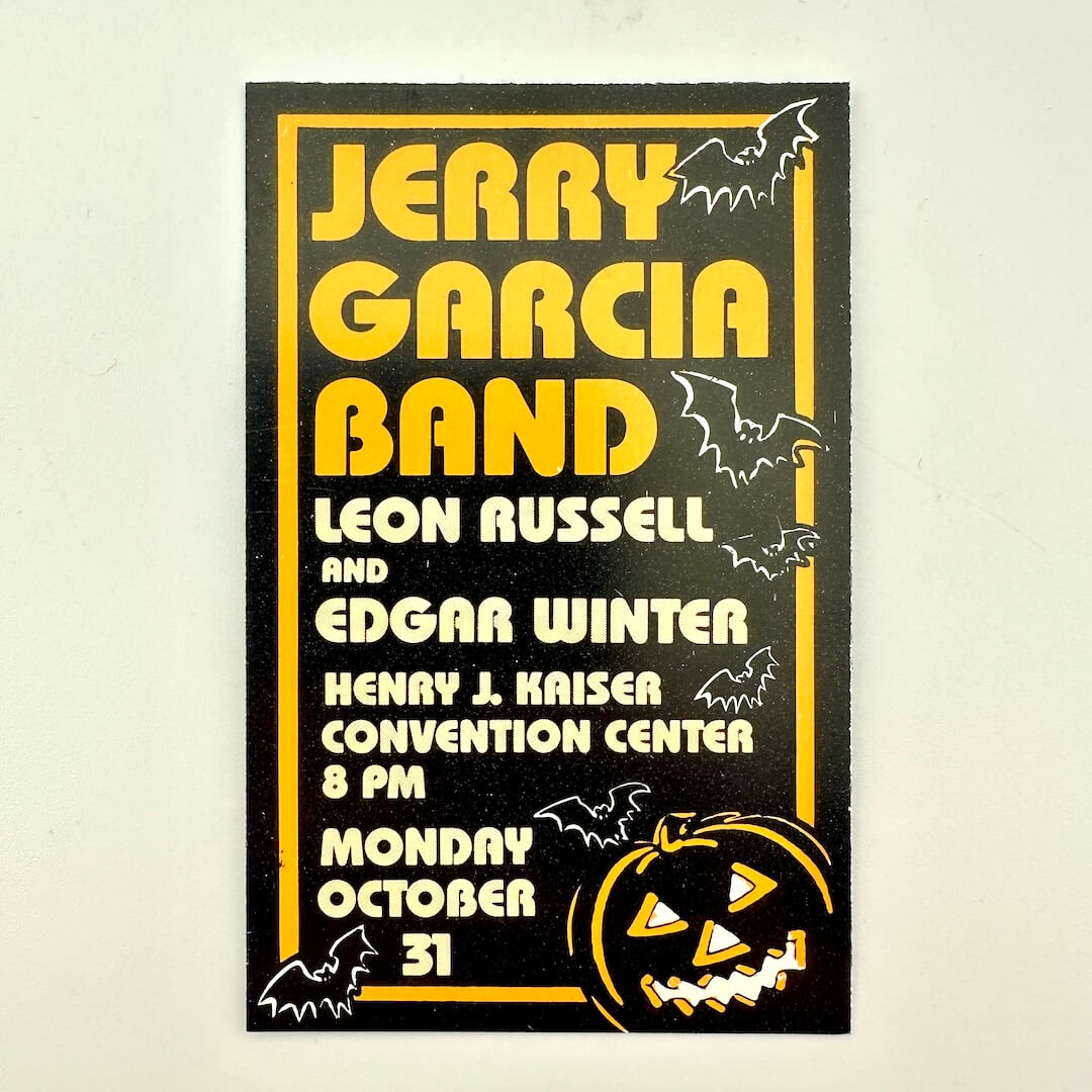 Promotional ticket for Jerry Garcia Band concert with Halloween elements on a light background