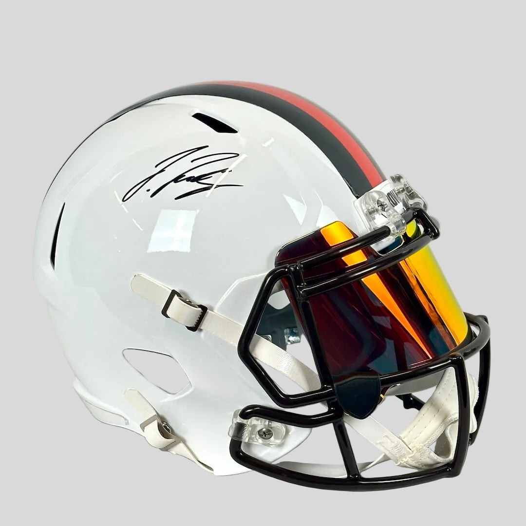 White football helmet with mirrored face shield and stripes down top center, signature on side. 