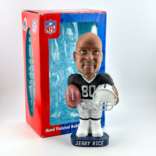Bobblehead figure of a football player with packaging featuring NFL branding.
