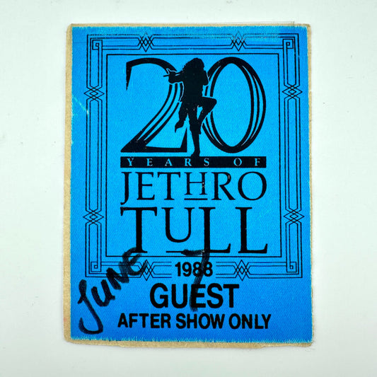 Blue fabric event pass with black text and graphics.