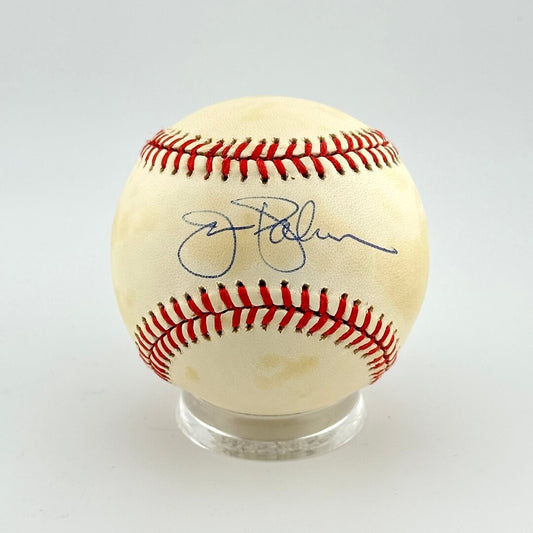 Baseball with autograph on a white background