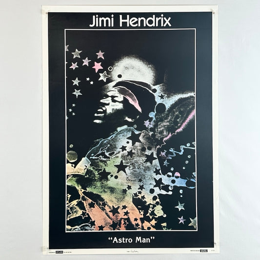 Black border with Jimi Hendrix & Astro Man at top & bottom around image of Jimi singing with pastel colors & stars.