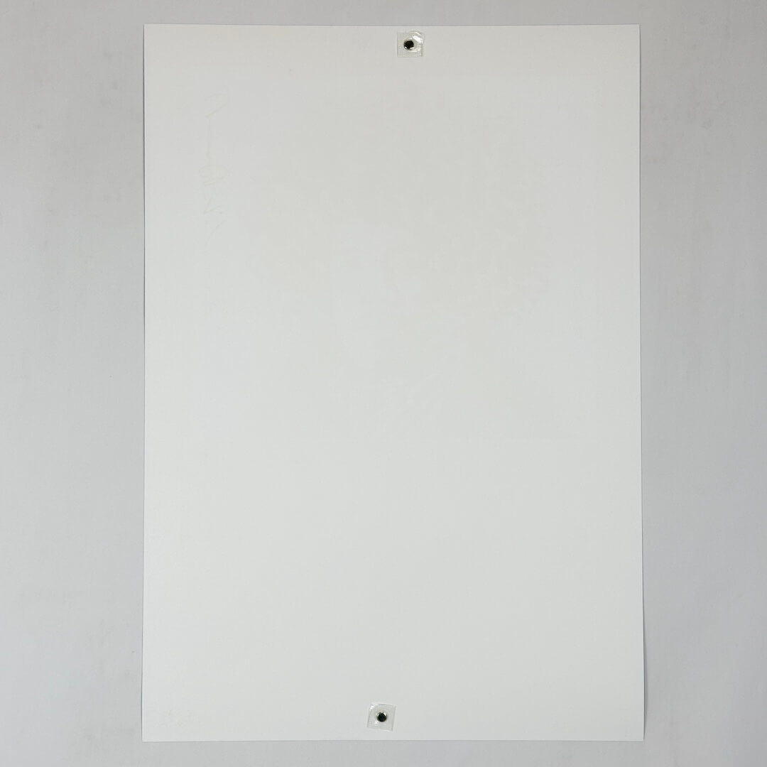 Backside of white poster to show zero damage and pristine condition, against white background. 