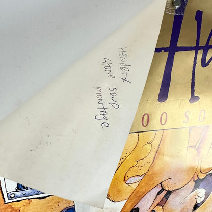 Top left corner rolled over to show artist name in pen on back. 