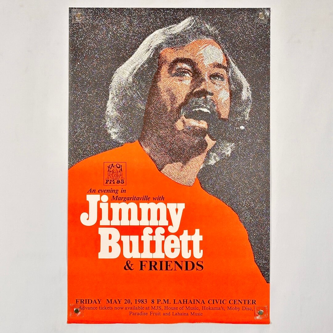 Poster for an evening with Jimmy Buffett & Friends featuring a stylized portrait of a man singing.