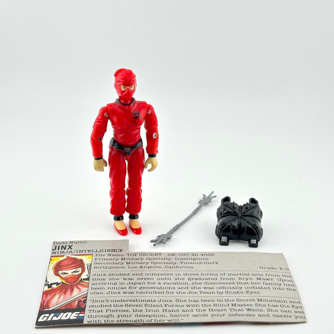G.I. Joe ninja action figure with accessories and character card against white background.