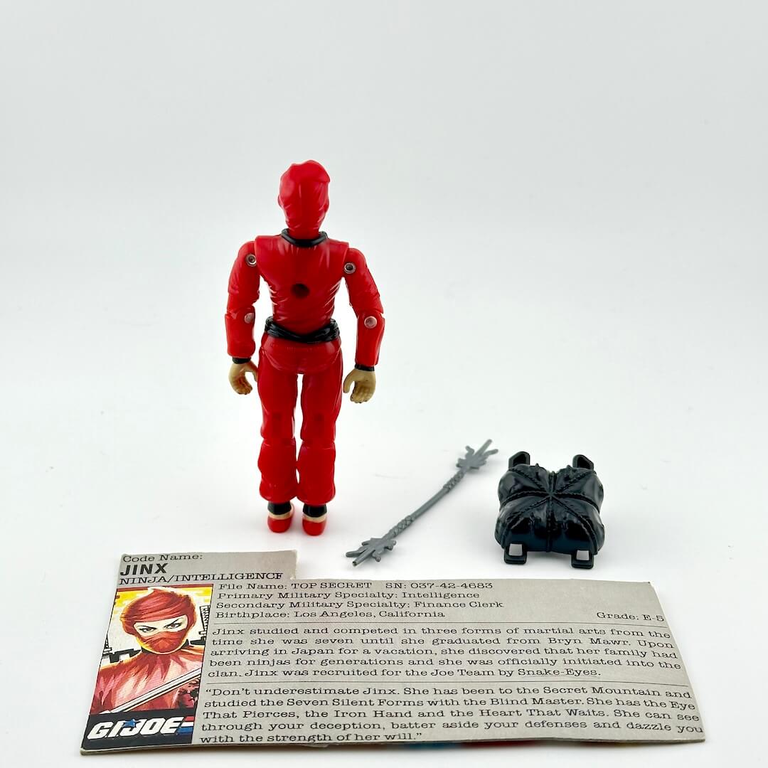 G.I. Joe ninja action figure with accessories and character card against white background.