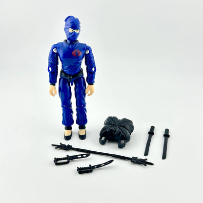 Blue action figure with accessories on a white background