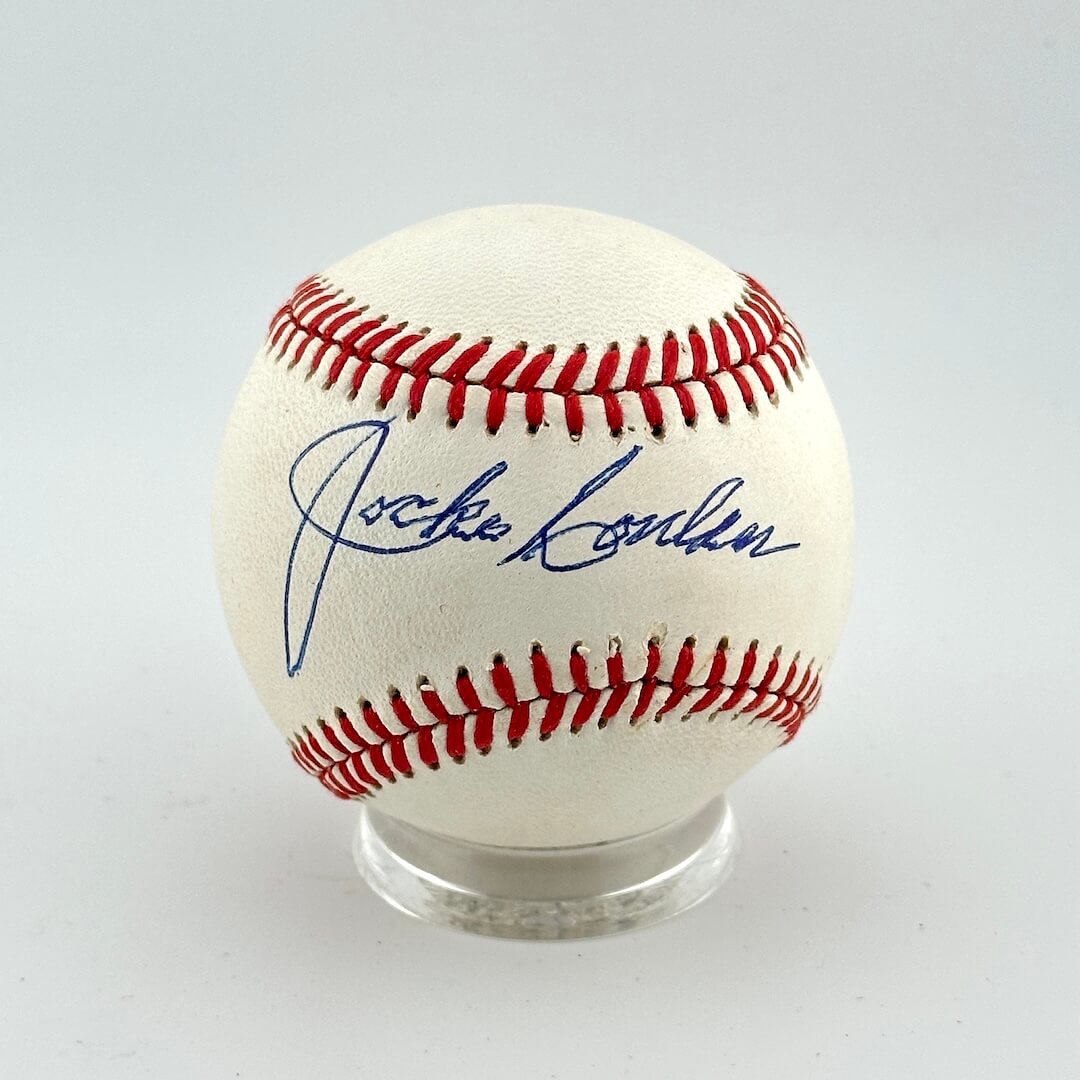 Baseball with autograph on a white background
