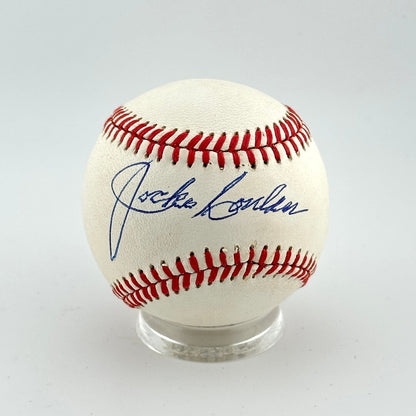 Baseball with autograph on a white background