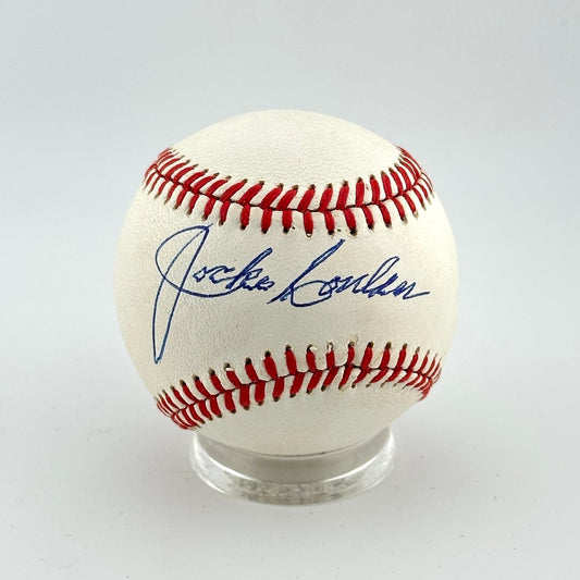 Baseball with autograph on a white background