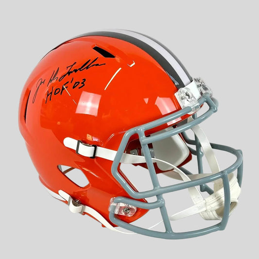 Orange football helmet with signature and 'HOF 03' text on a white background