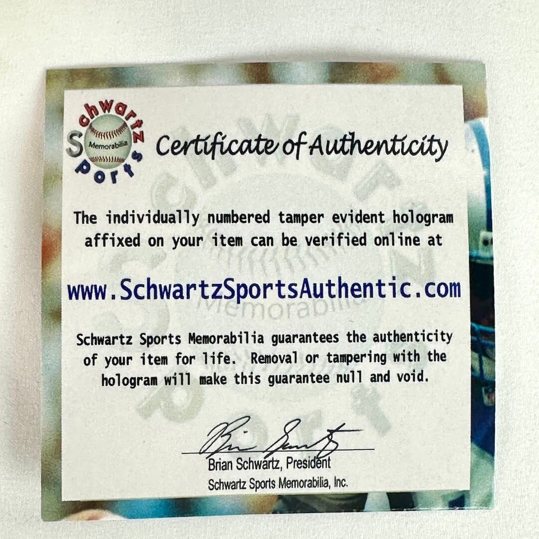 Certificate of Authenticity from Schwartz Sports Memorabilia with a hologram verification website.
