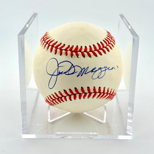 Autographed baseball in a clear display case with a white background