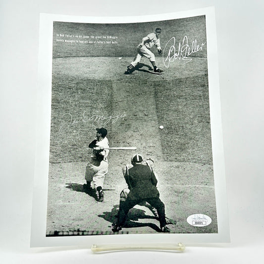 Black and white photograph of two baseball players mid-game with two signatures against white background.