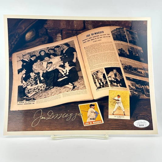Photograph of memorabilia collage featuring signature of player, JSA authentication sticker in corner. 