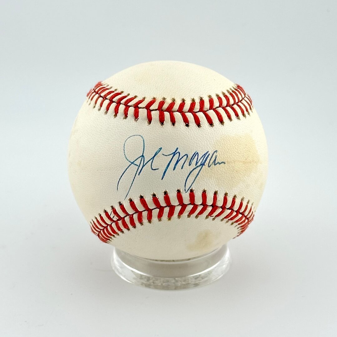 Baseball with autograph on a white background