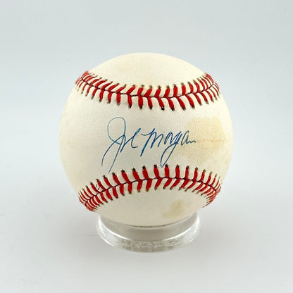 Baseball with autograph on a white background