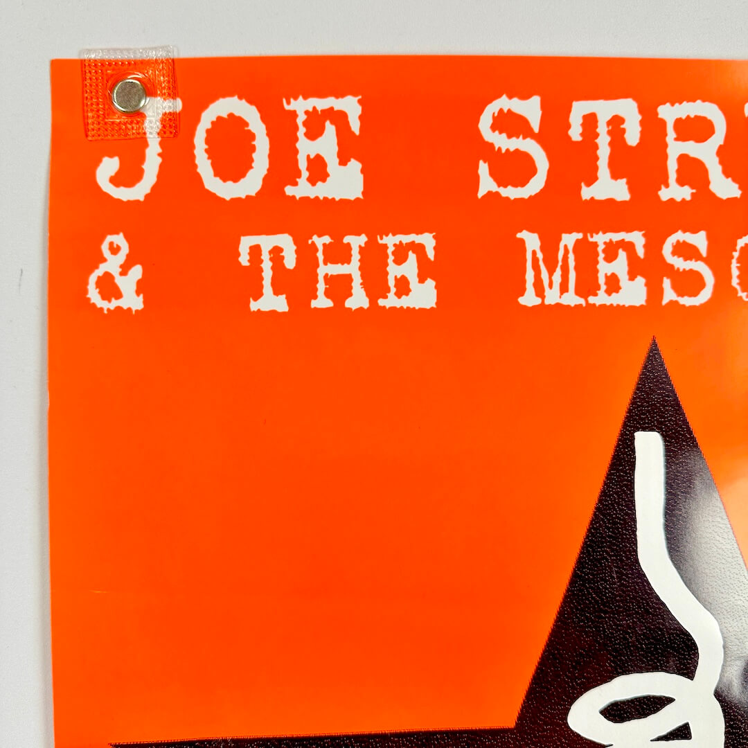 Top left corner of poster with no visible damage. 