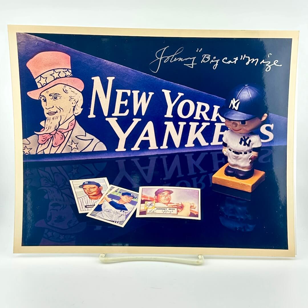 Photo of arranged baseball memorabilia featuring Big Cat Mize and his signature.