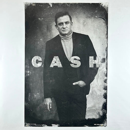 Black and white portrait of a person with 'CASH' text overlay on a white background