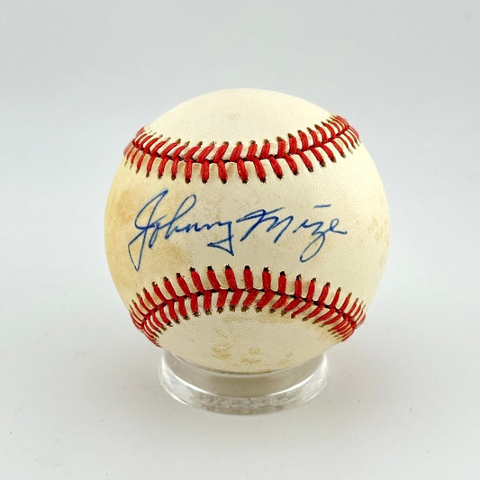 Baseball with autograph on a white background