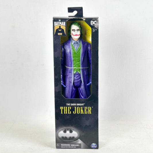 Action figure packaging of The Joker from Batman series on a white background