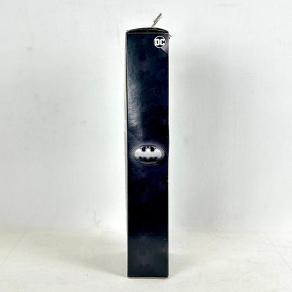 Batman-themed product packaging with DC logo on a white background