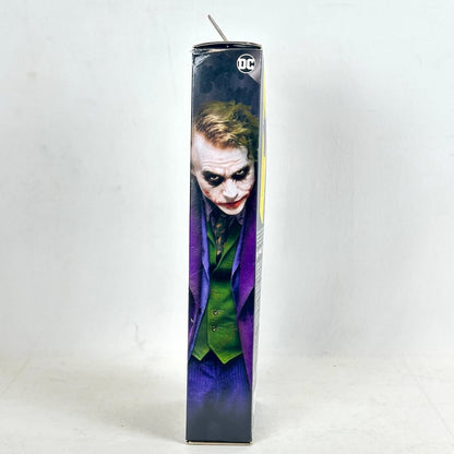 Figure in a box featuring the Joker character from DC Comics on a white background