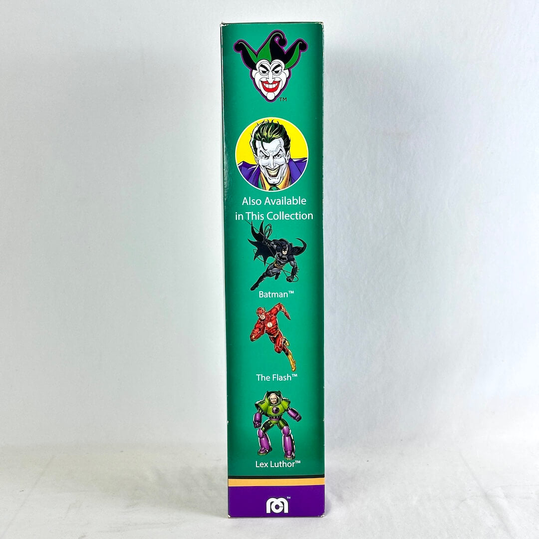 Side view of Joker action figure packaging with images of other available figures and Mego logo. 