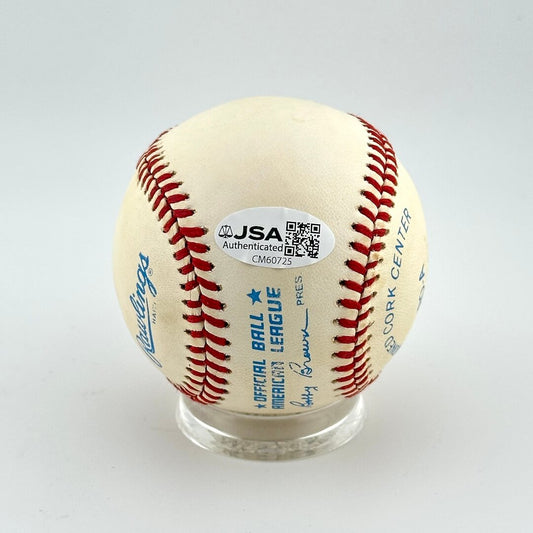 Baseball with JSA Authentication label on a white background