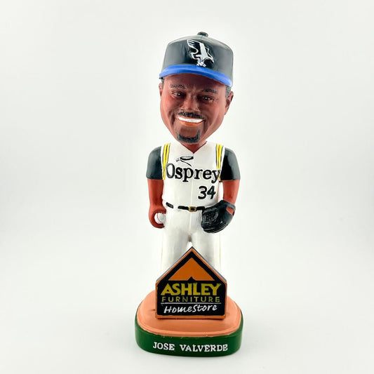 Bobblehead figure of a baseball player with 'Osprey' and 'Ashley Furniture HomeStore' branding on a white background