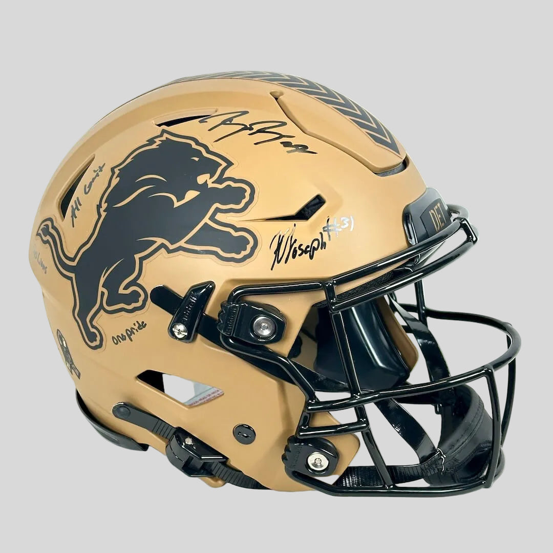 Beige football helmet with black face mask and logo on a white background
