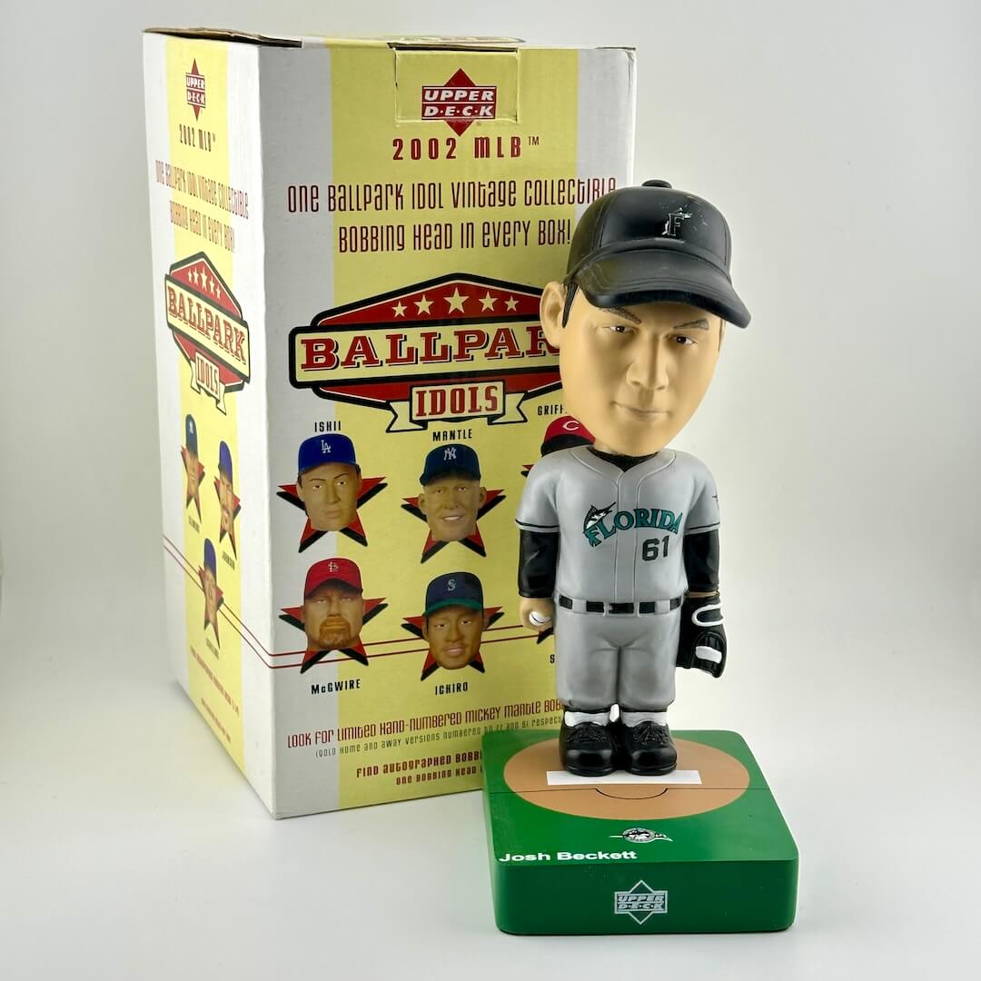 Baseball bobblehead figure with packaging on a white background
