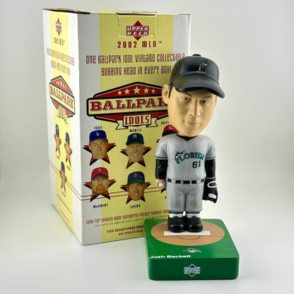 Baseball bobblehead figure with packaging on a white background