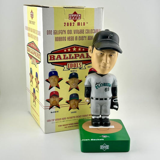 Baseball bobblehead figure with packaging on a white background