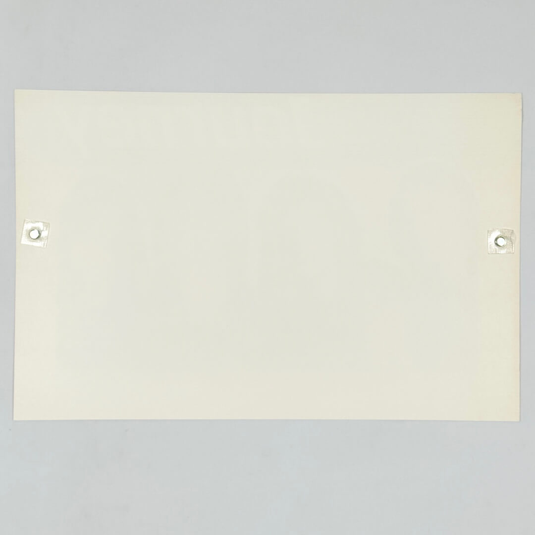 Backside of white poster against white background. 