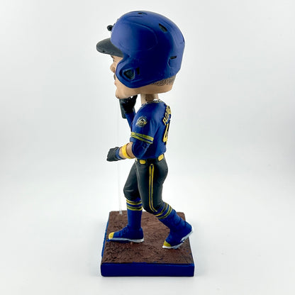 Bobblehead figure of a baseball player in blue uniform with helmet on a white background