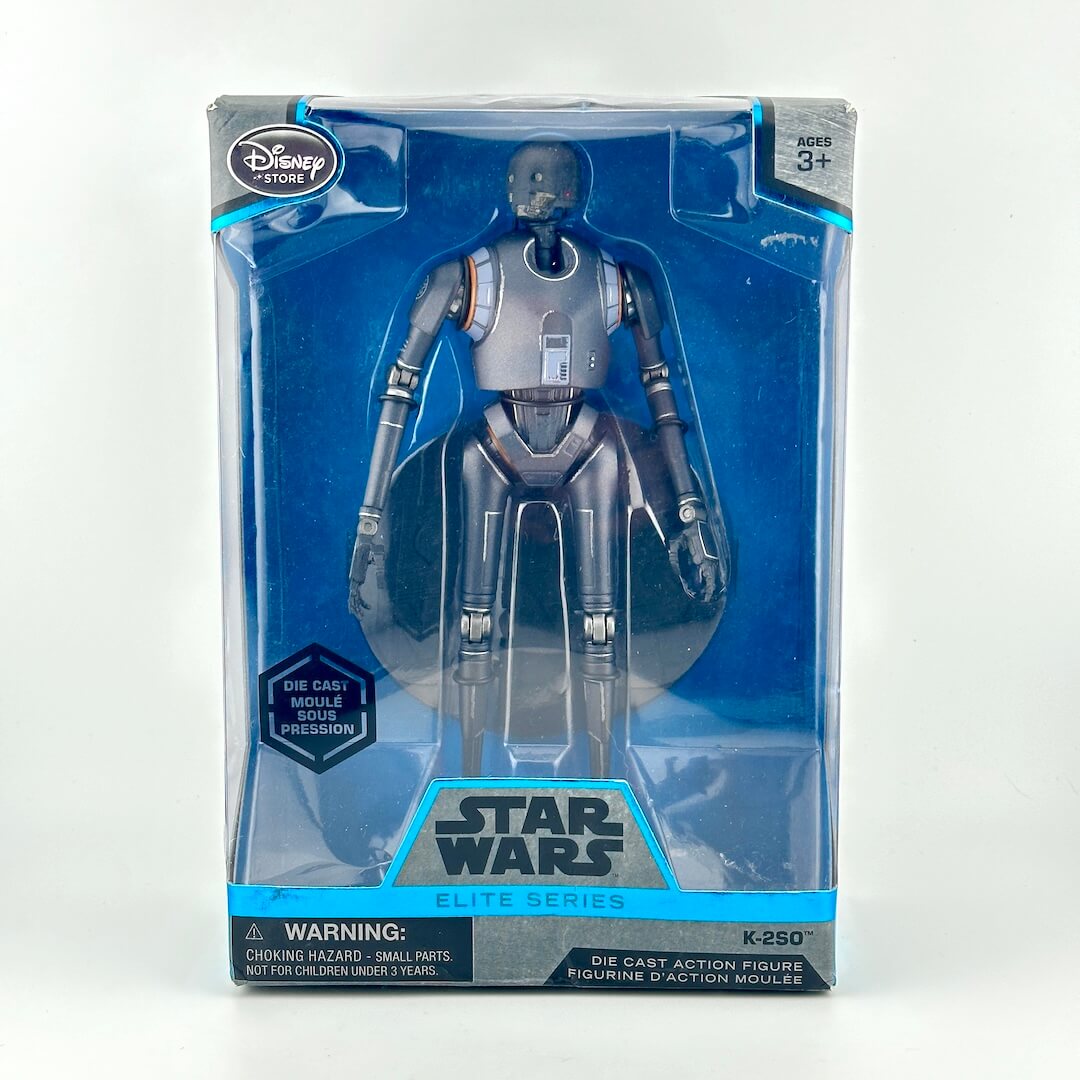 Star Wars action figure in original window packaging showing a black droid figure with blue background. 