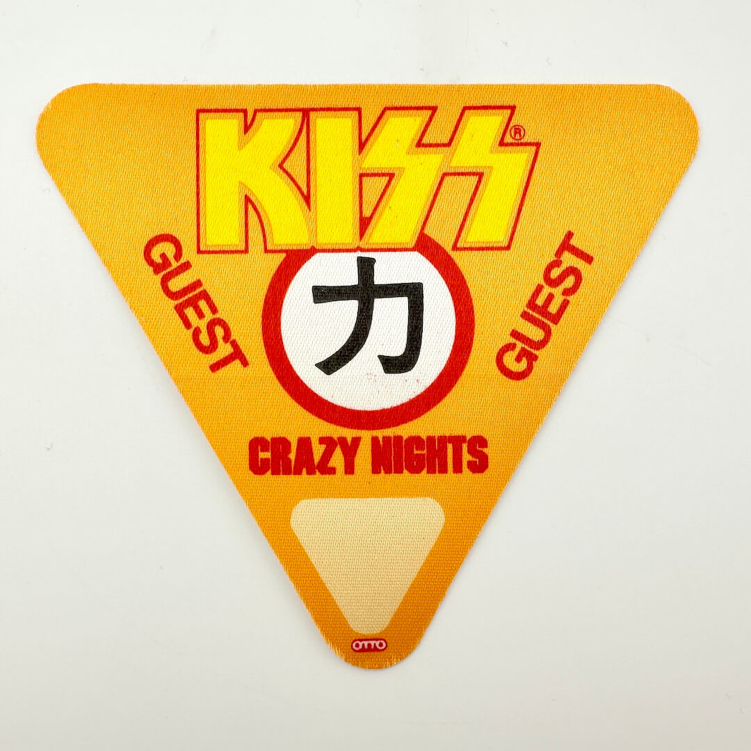 Kiss concert ticket with triangular shape on a white background