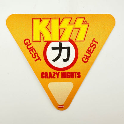 Kiss concert ticket with triangular shape on a white background
