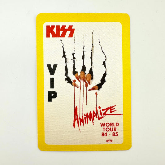 A KISS 'Animalize' VIP world tour 1984-1985 collectible card featuring the band's logo in red, claw marks dripping with red. 
