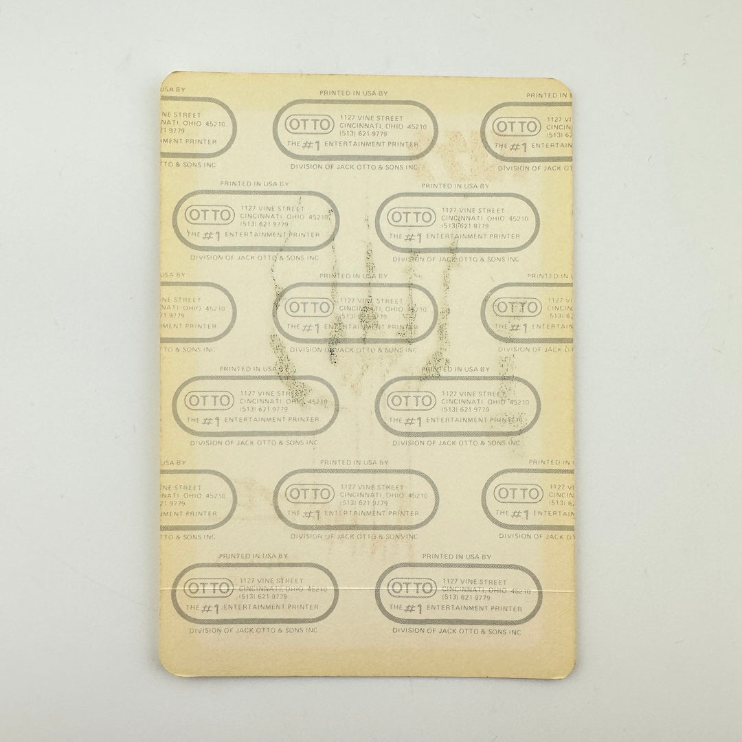 Backside of pass showing intact paper backing and mint condition. 